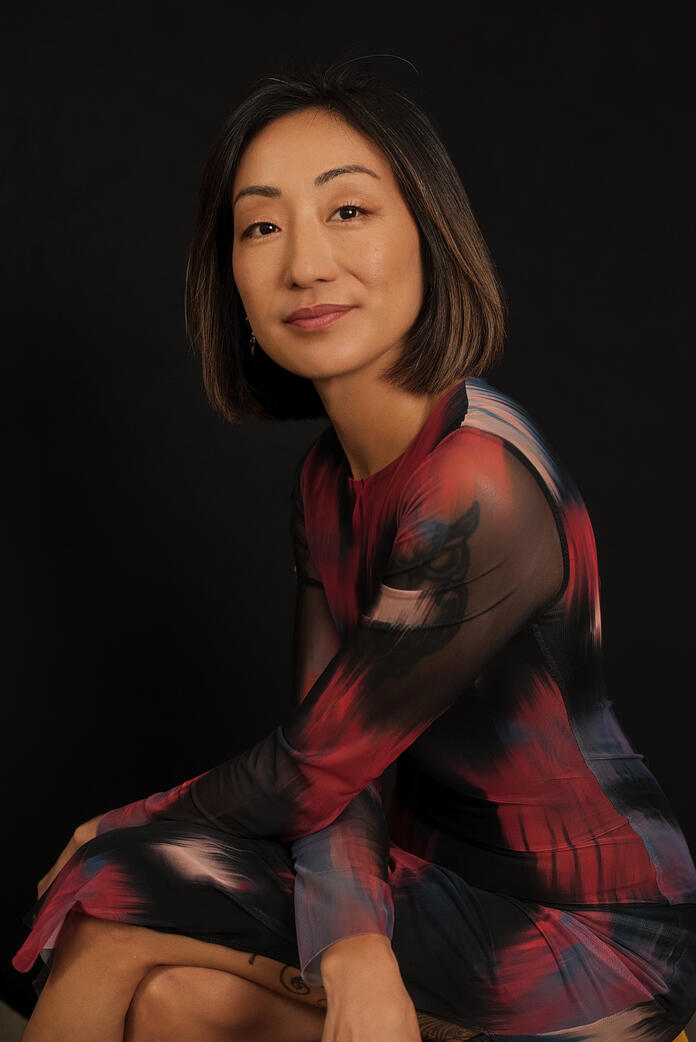 Photo of asian woman, Berlin studio Photo of asian woman in sleek dress, Berlin studio photoshoot